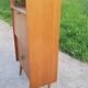 Library secretary of the 50s in blond oak compass feet