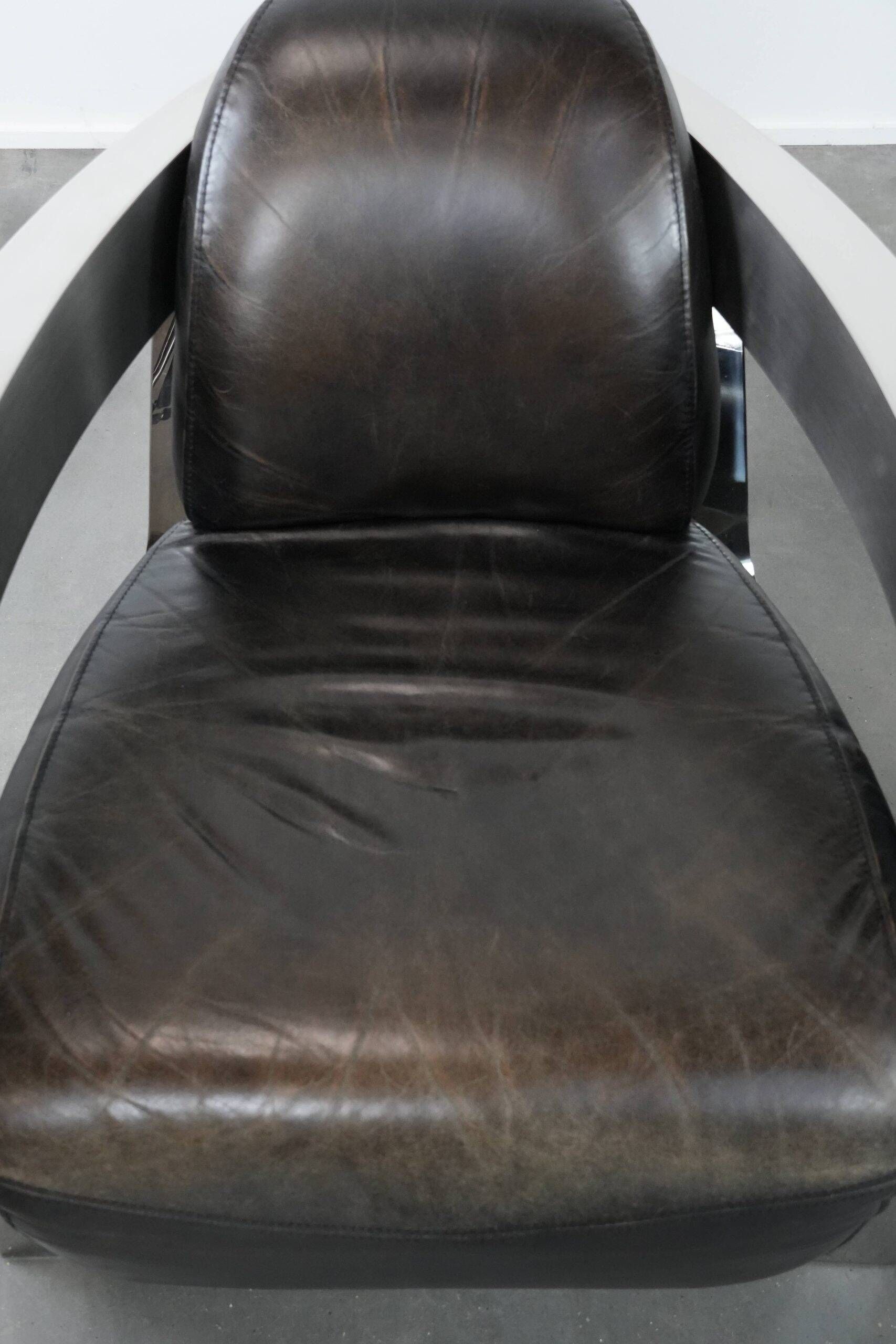 Set of two cowhide leather Aviator design armchairs with aluminium
