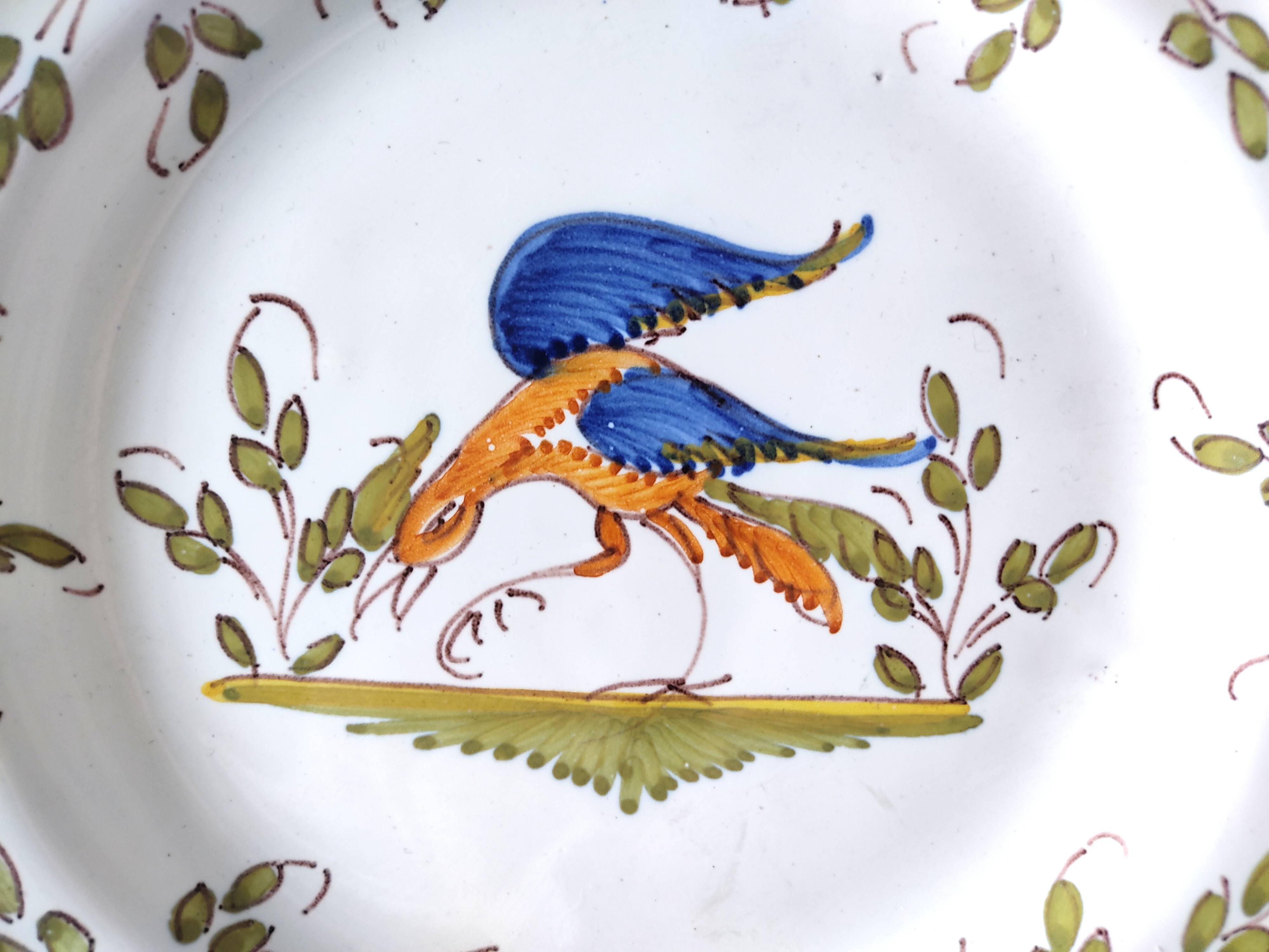 Moustiers earthenware decorative plate with bird