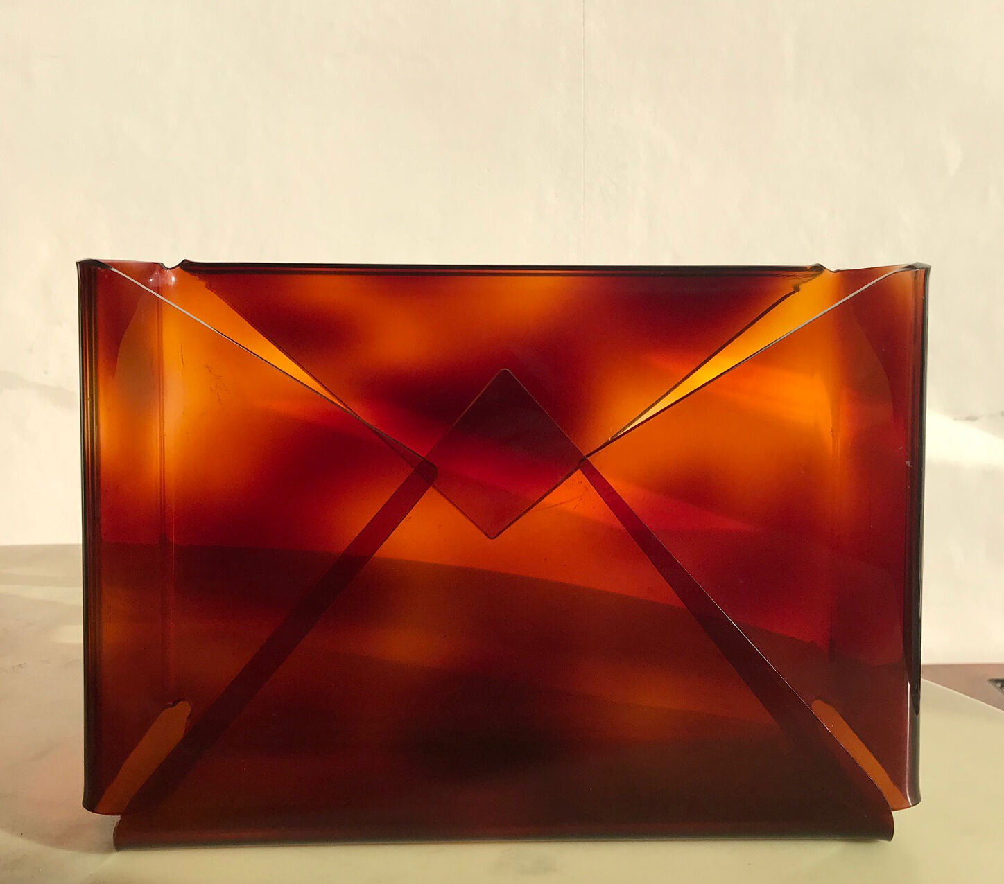 Revised door or document holder in smoked plexiglass from the 1970s