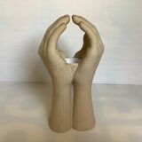 Hand-shaped candle holder