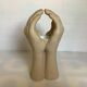 Hand-shaped candle holder