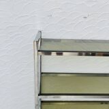 Chrome and smoked glass shelf in Italian 1970s style.