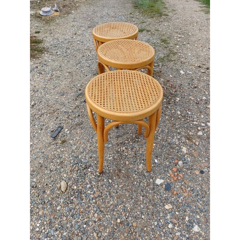 3 wooden and cane stools