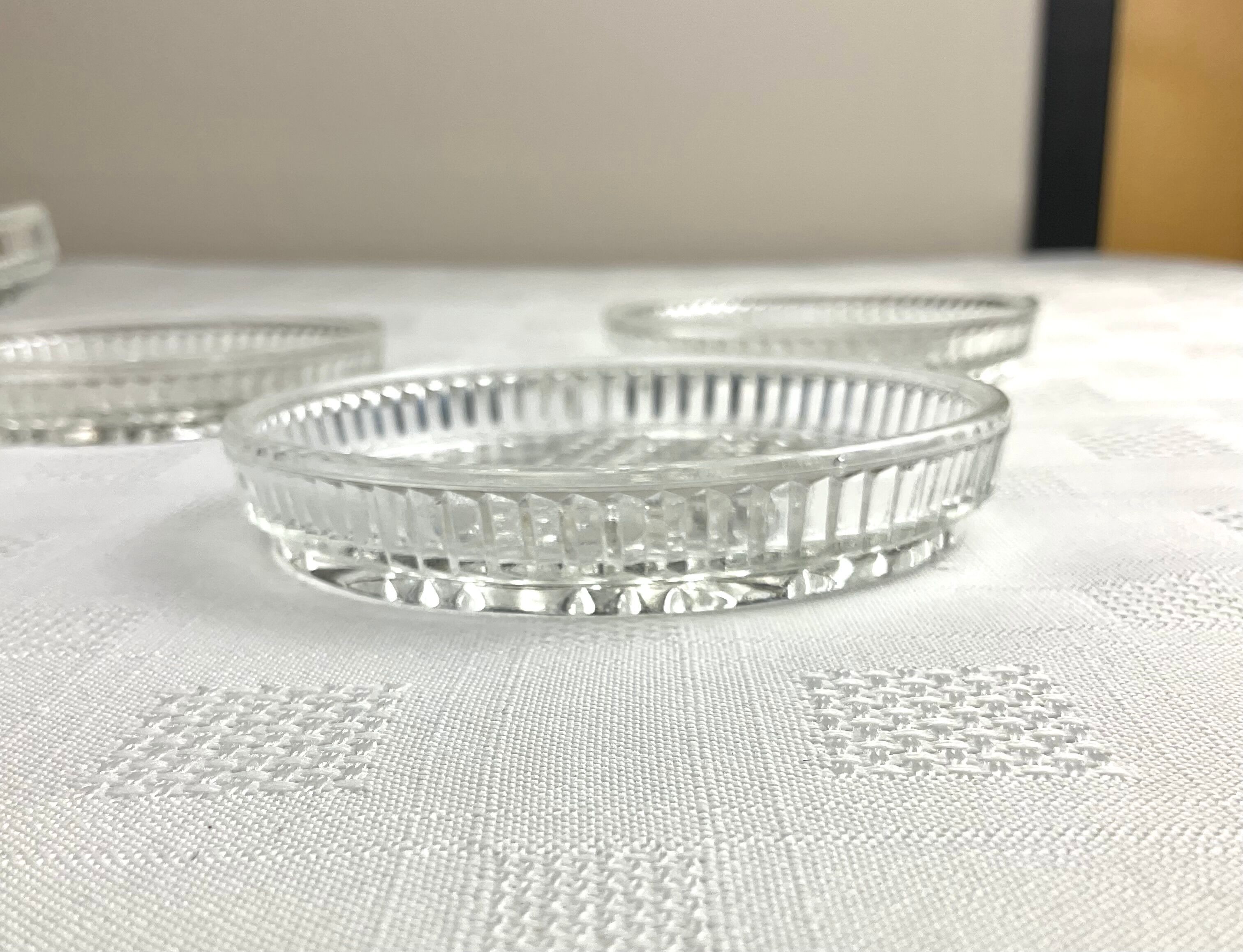 Series of 4 vintage glass coasters