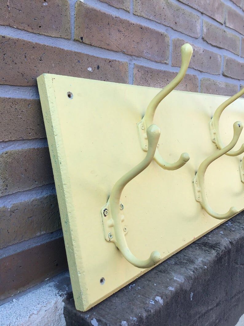 Industrial wall coat holder