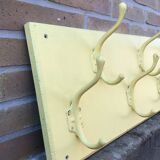 Industrial wall coat holder