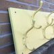 Industrial wall coat holder
