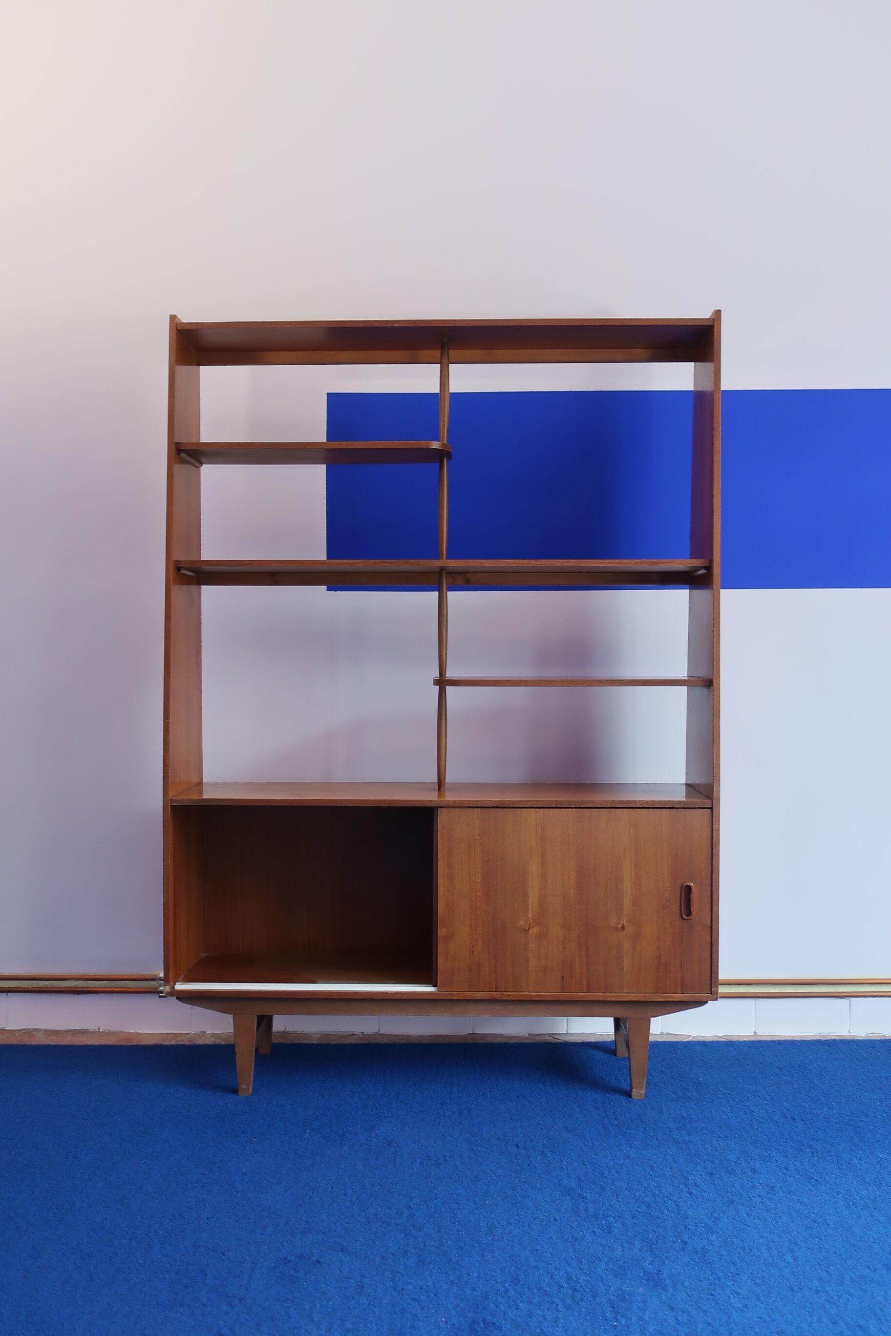 Library separator of 60s teak pieces