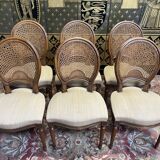 Suite of 6 Louis XVI style chairs in cane and fabric