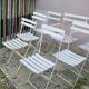 Series of 6 chairs and 1 folding armchair of iron garden bistro