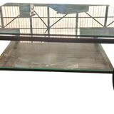 Table basse vintage des années 70 design par Pierre Vandel. Très bon état.