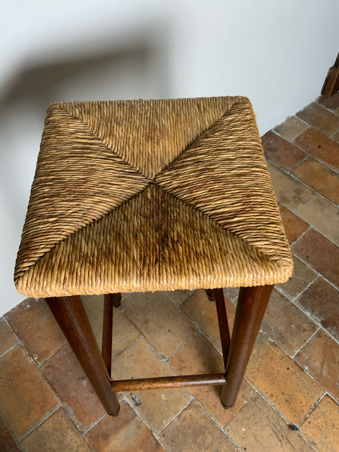 High straw stool