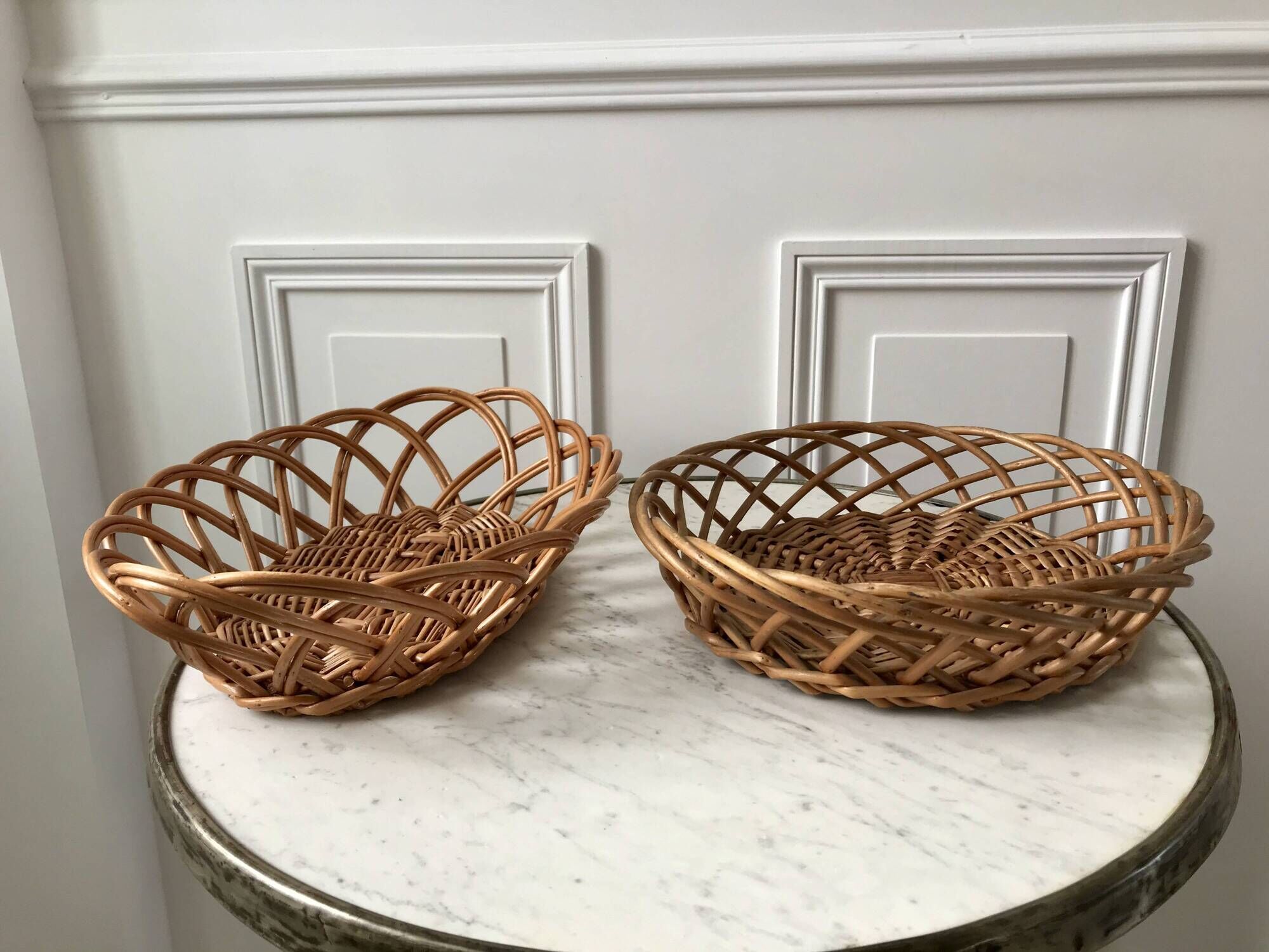 trio of woven rattan and bamboo baskets from the 60s and 70s