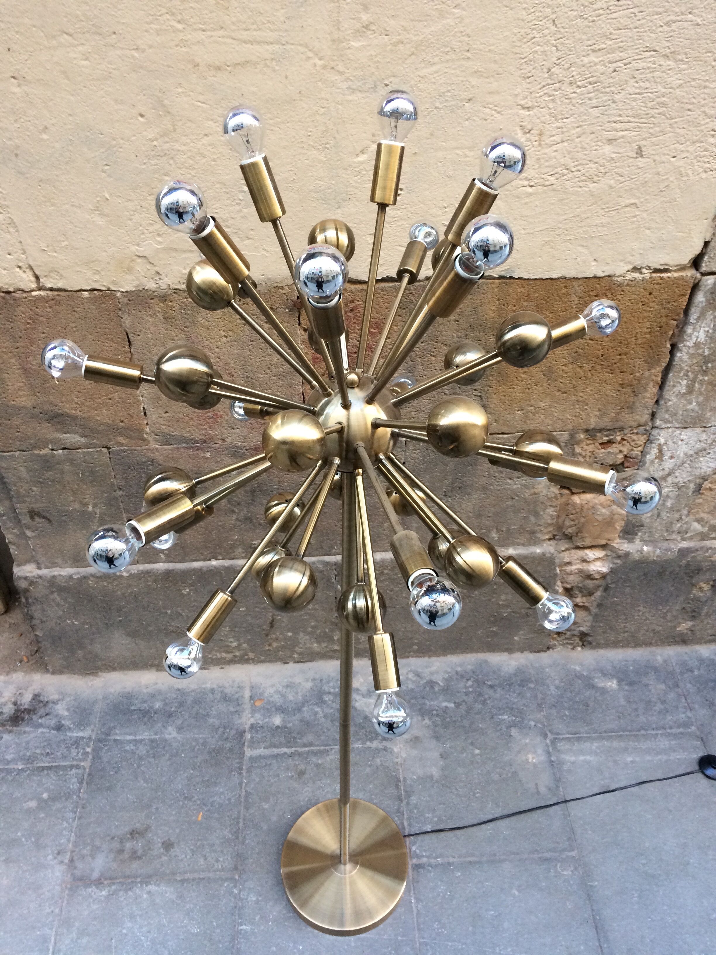 Floor lamp in gold metal of the 1960s