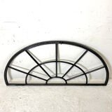 Old arched anthracite grey window
