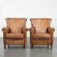 Set of two vintage sheepskin armchairs with beautiful and warm colours
