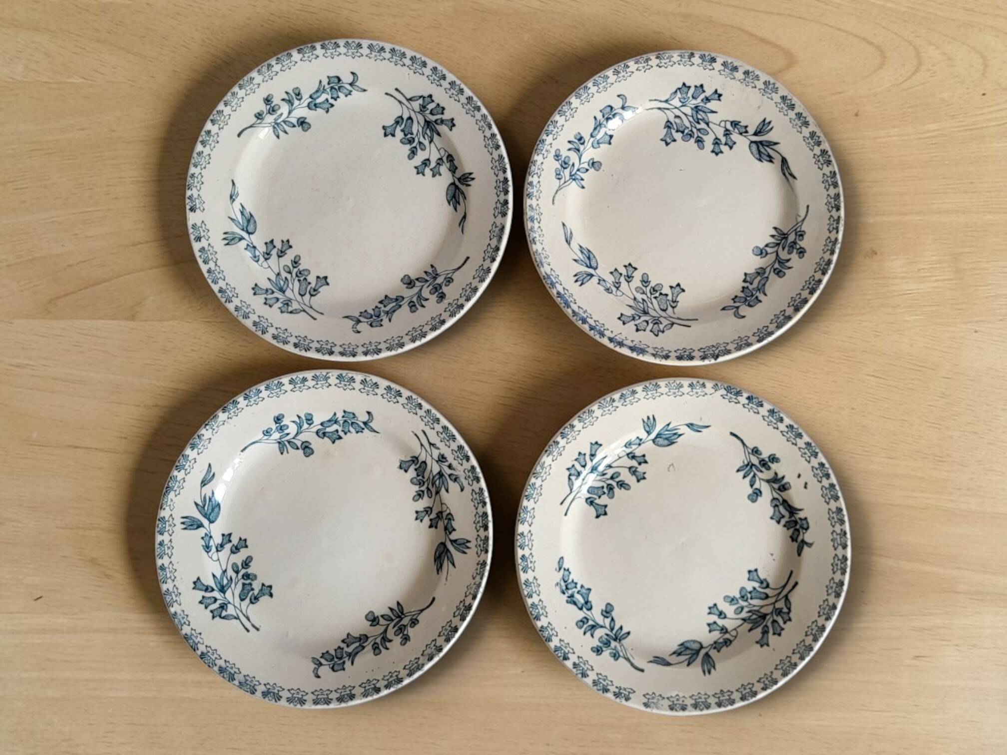 4 earthenware plates, Grigny — "Muguet" model