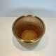 Rattan and brass wastepaper basket in the style of Gabriela Crespi.