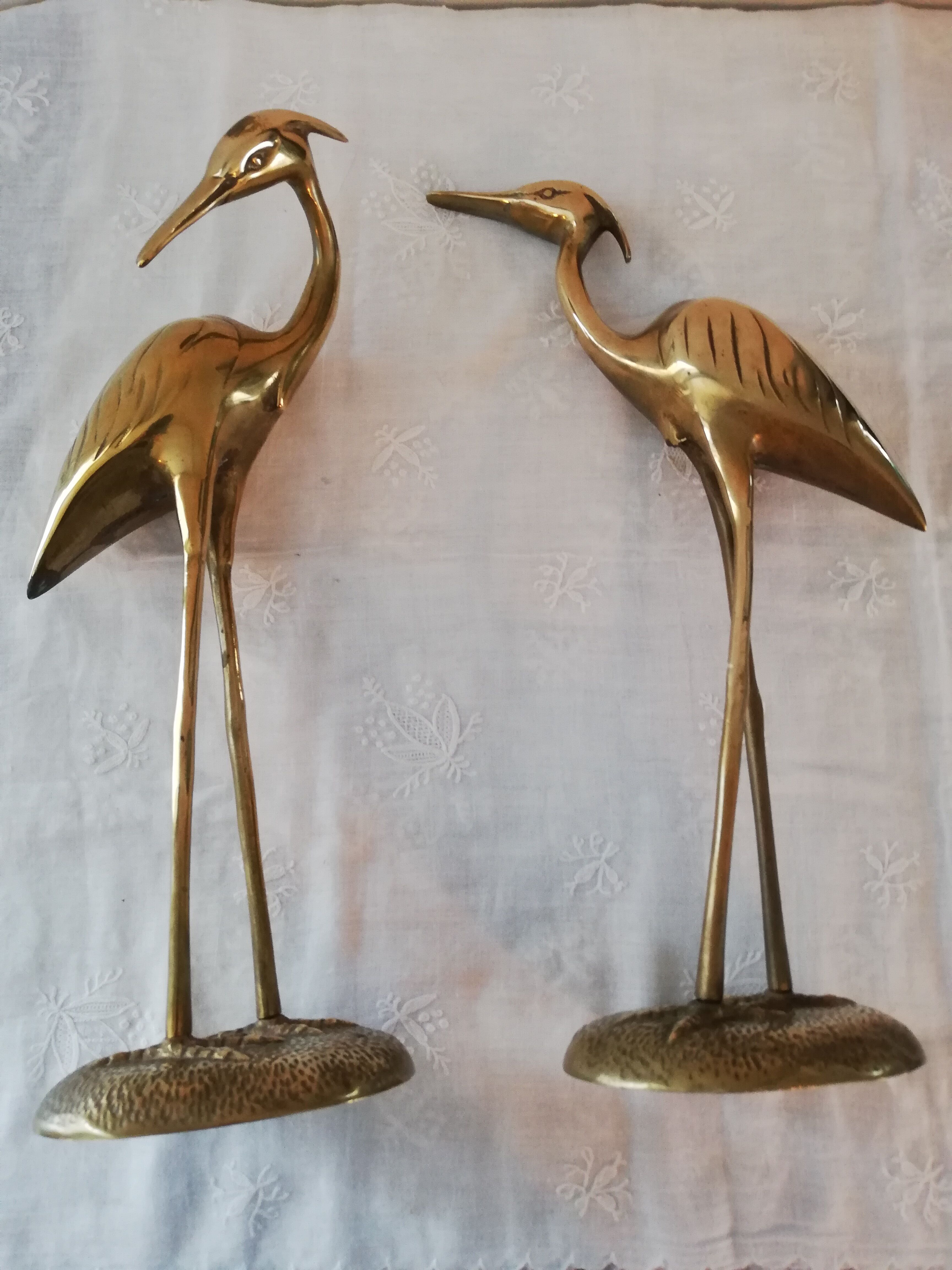 Couple of brass herons
