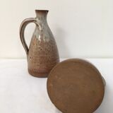 Duo of pitchers signed enamelled sandstone 1970
