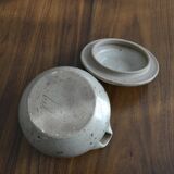 Ceramic pot with sandstone lid