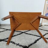 Coffee table with wooden compass legs