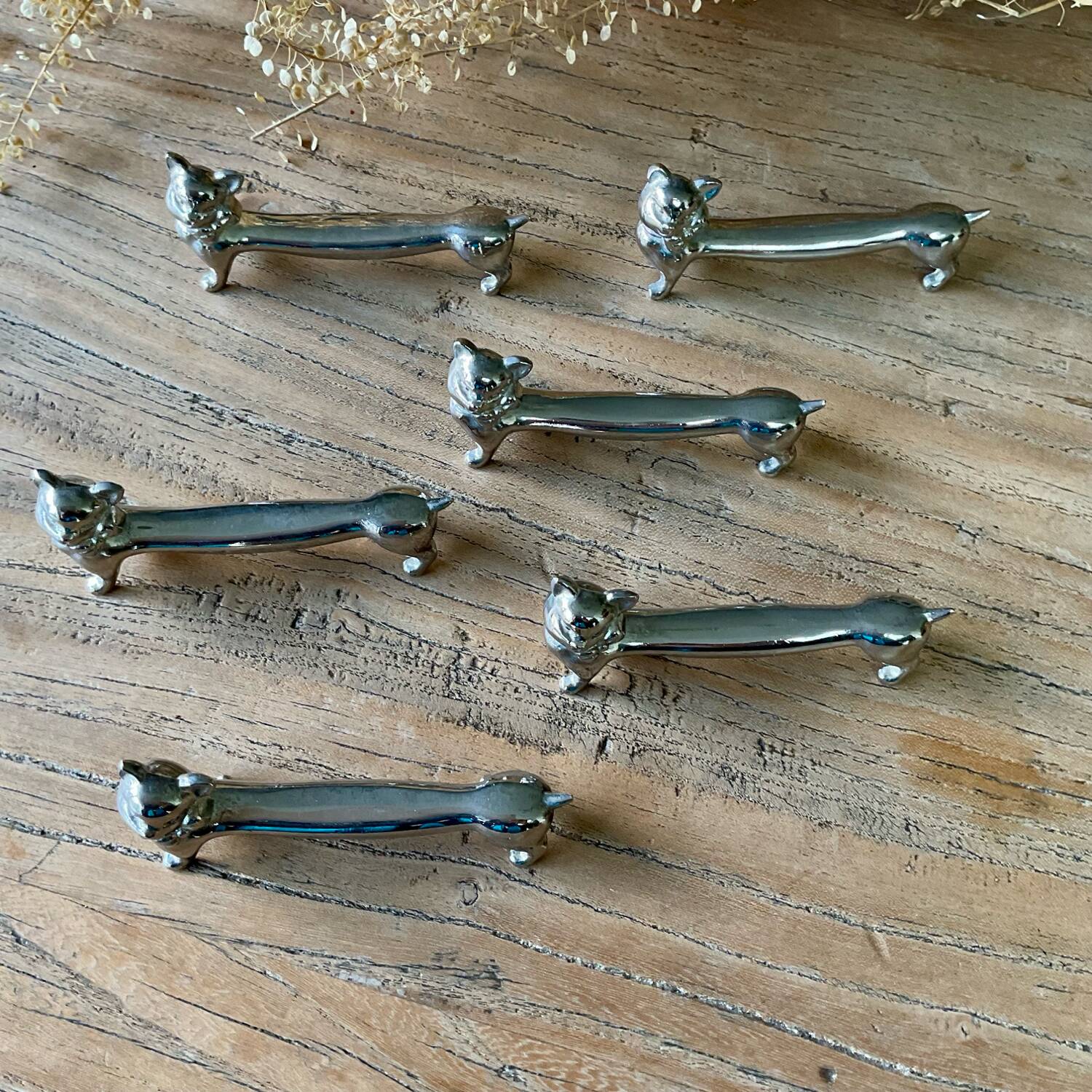 6 silver metal “cat” knife holders