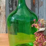 Superb antique green glass demijohn.