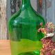 Superbe dame jeanne ancienne en verre vert