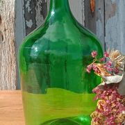 Superb antique green glass demijohn.