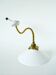 Swan neck wall light in smooth opaline and brass, early 20th century.