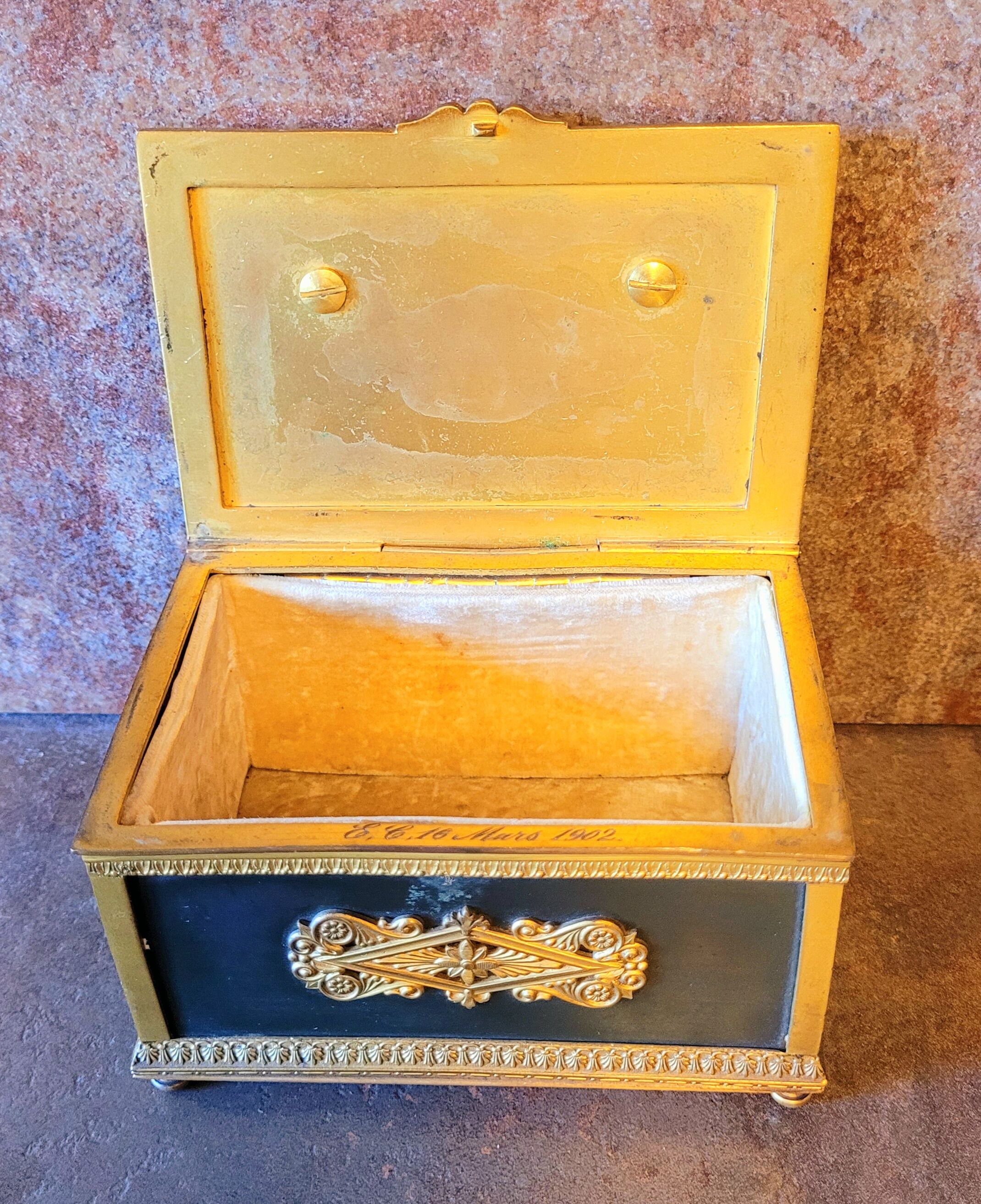 Old vintage box in gilded bronze empire