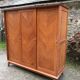 Vintage wardrobe compass feet with 3 sliding oak doors.