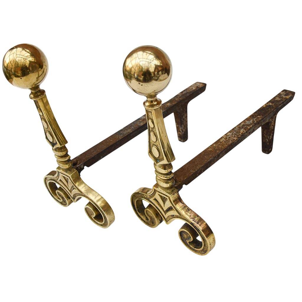 Gilded bronze andirons with rounded ball and patterns, antique fireplace accessory