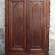 Antique solid wood wardrobe in historical rustic style from the 19th century.