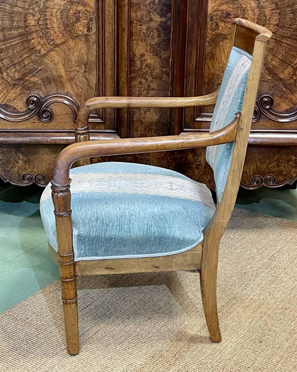 Restoration period armchair in 19th century cherry