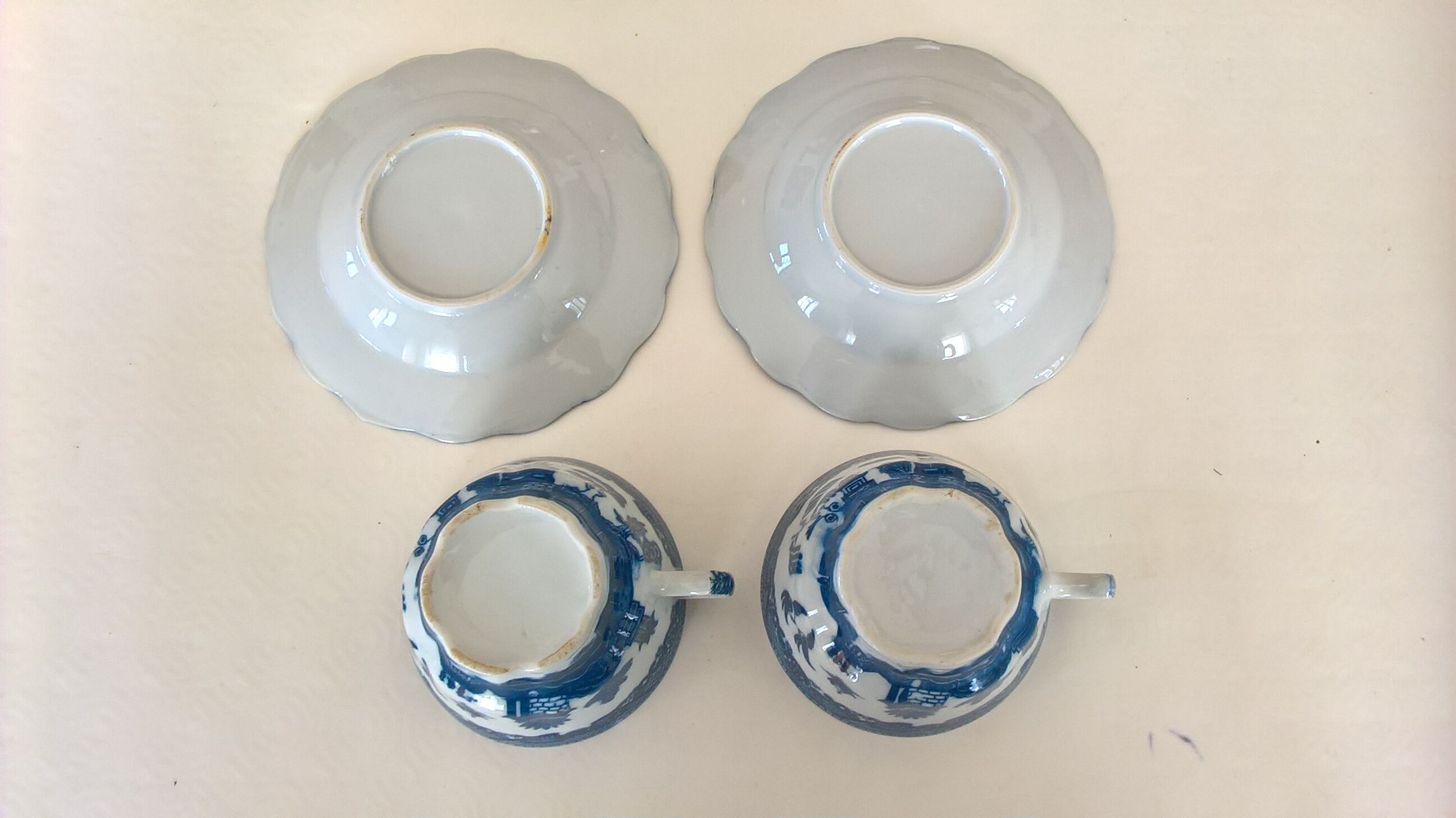 Two Blue Willow porcelain tea cups