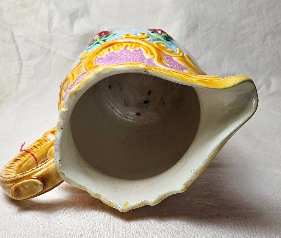 Art nouveau floral decorated barbotine pitcher