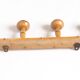 Light wood coat hooks 1900