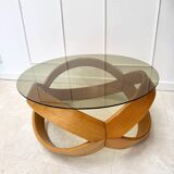 Smoked glass and curved wood coffee table