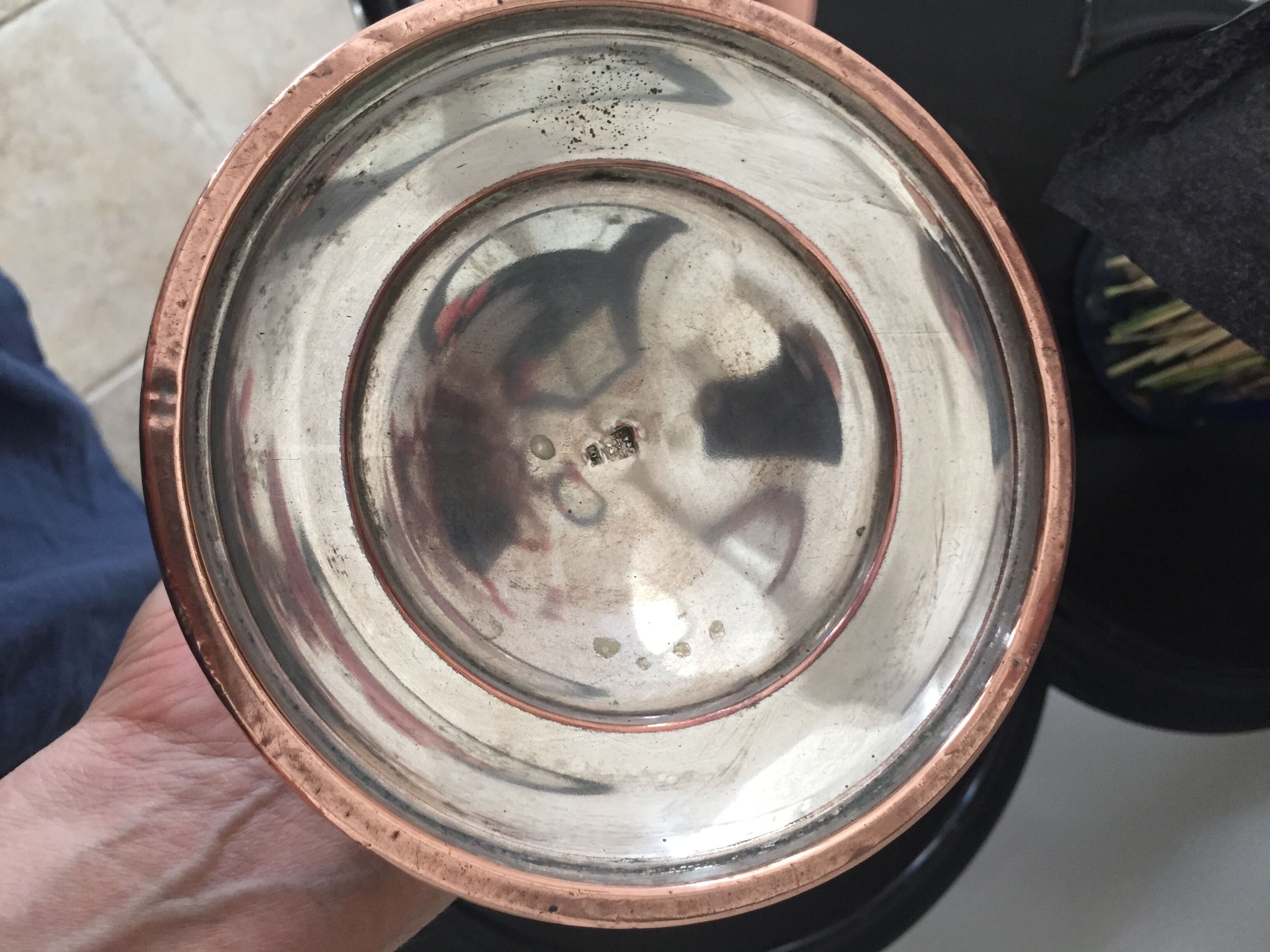 Pair of pink copper candlesticks