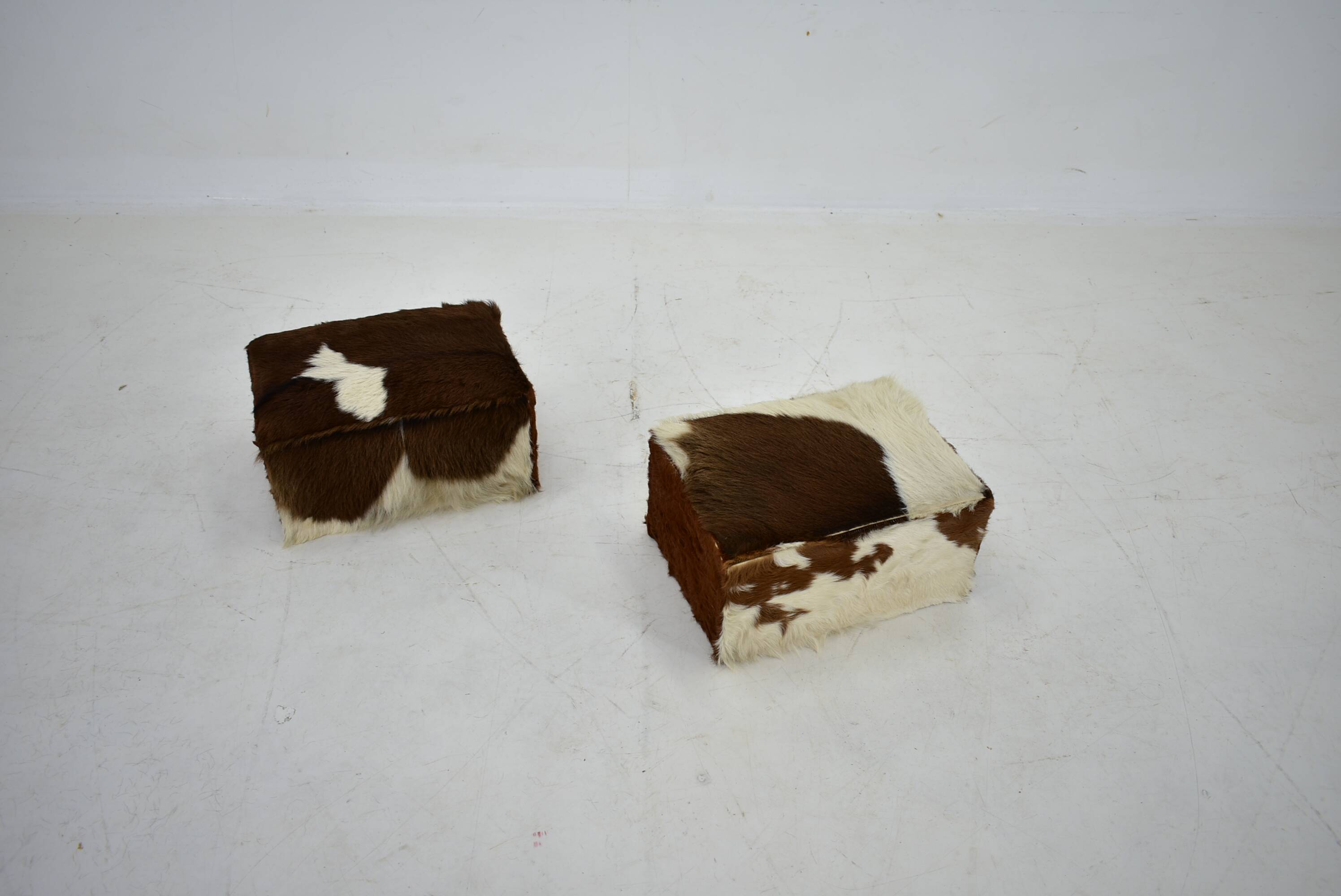 red brown leather cowhide footstools , poufs, 80s