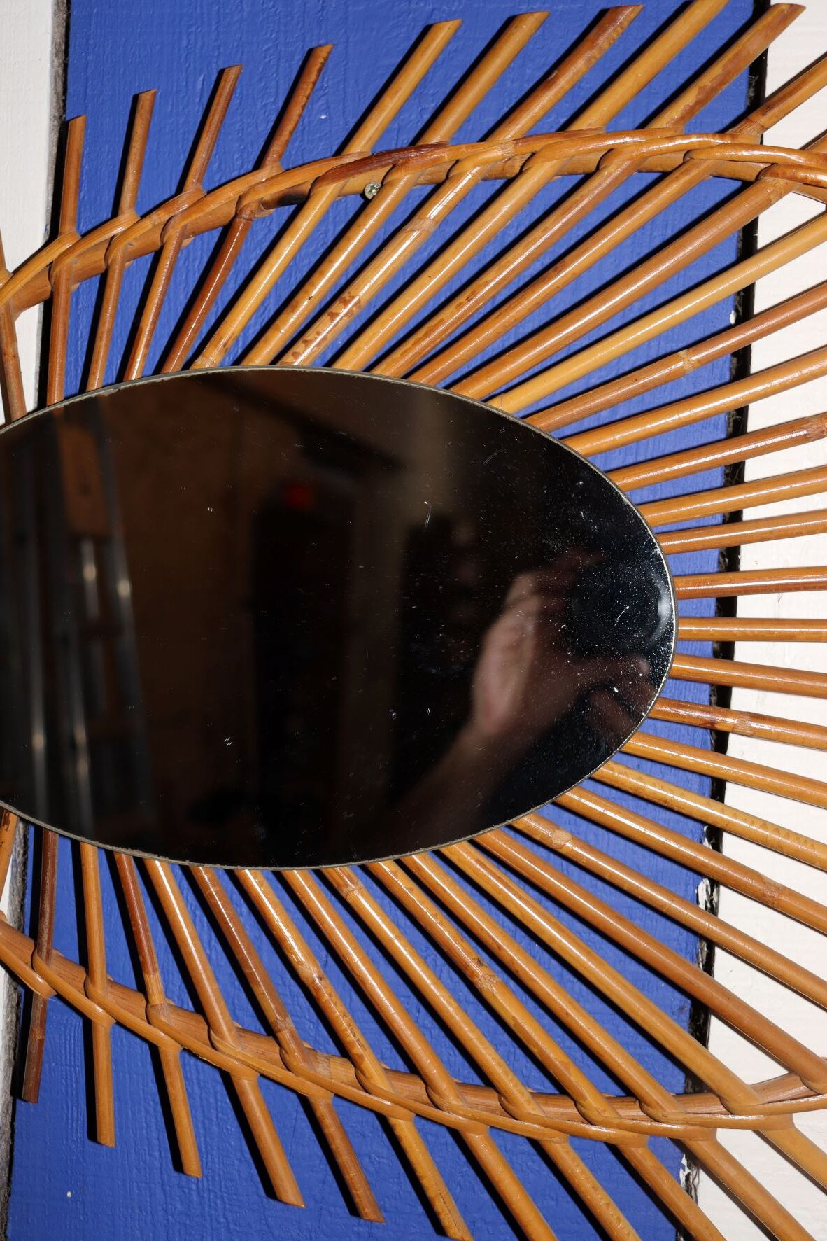 Oval rattan mirror