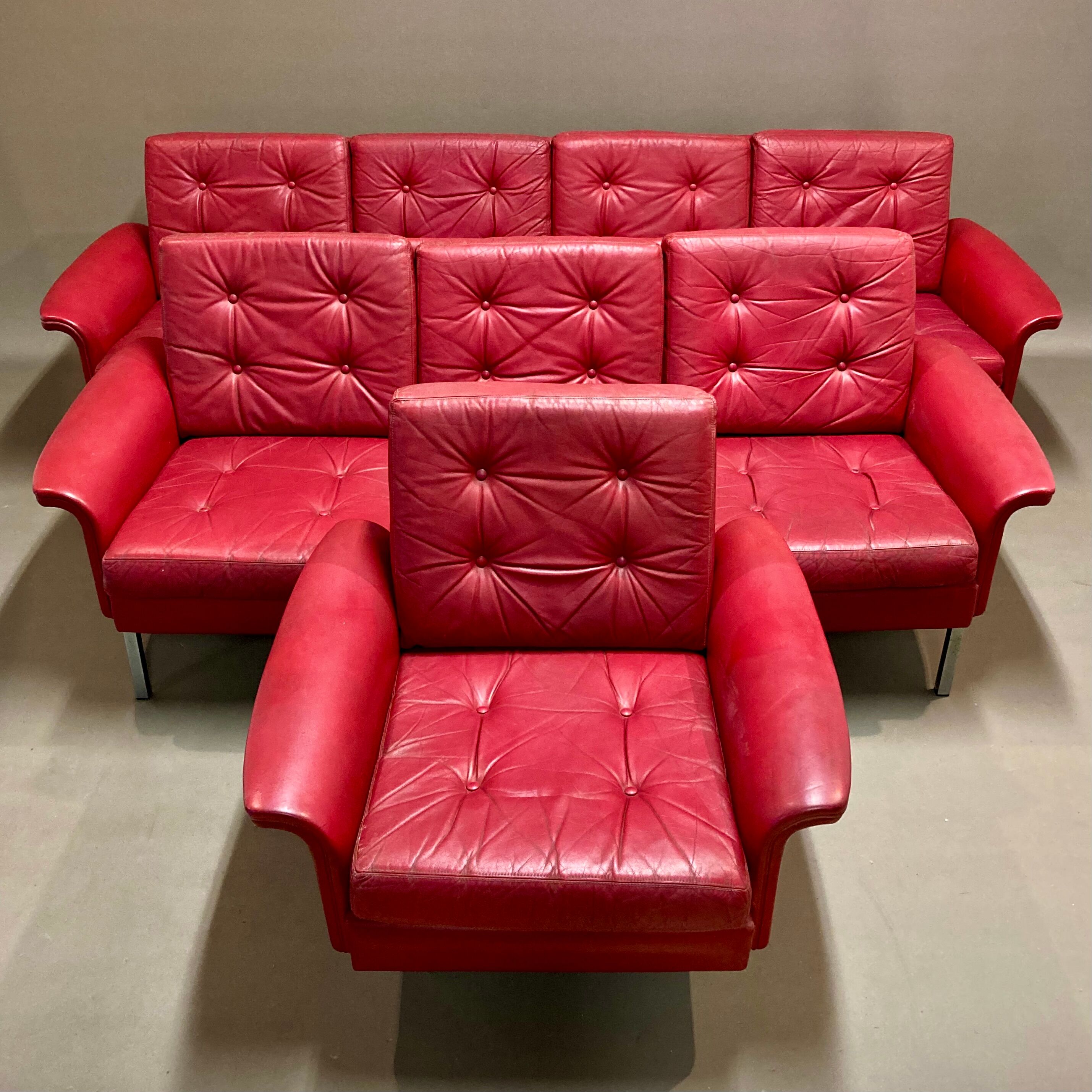 Red leather armchair design 1950