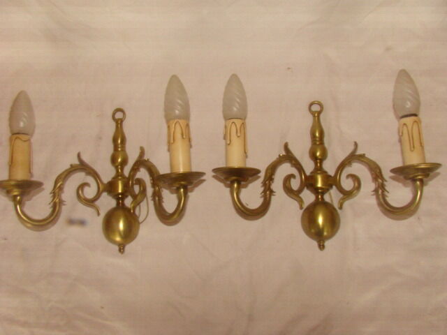 Pair of bronze wall lights with 2 arms in "Dutch" style.