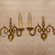 Pair of bronze wall lights with 2 arms in "Dutch" style.