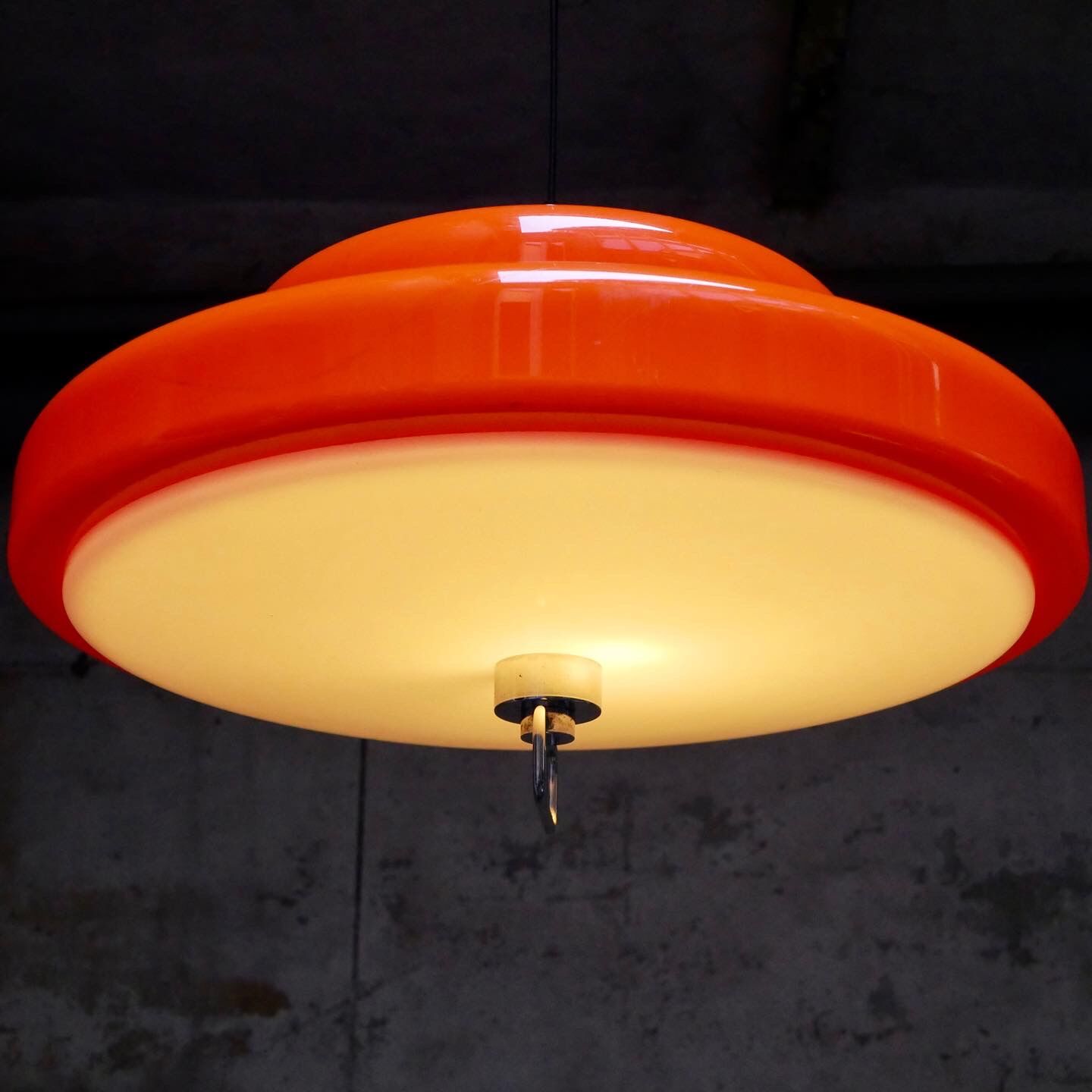 Orange space age suspension