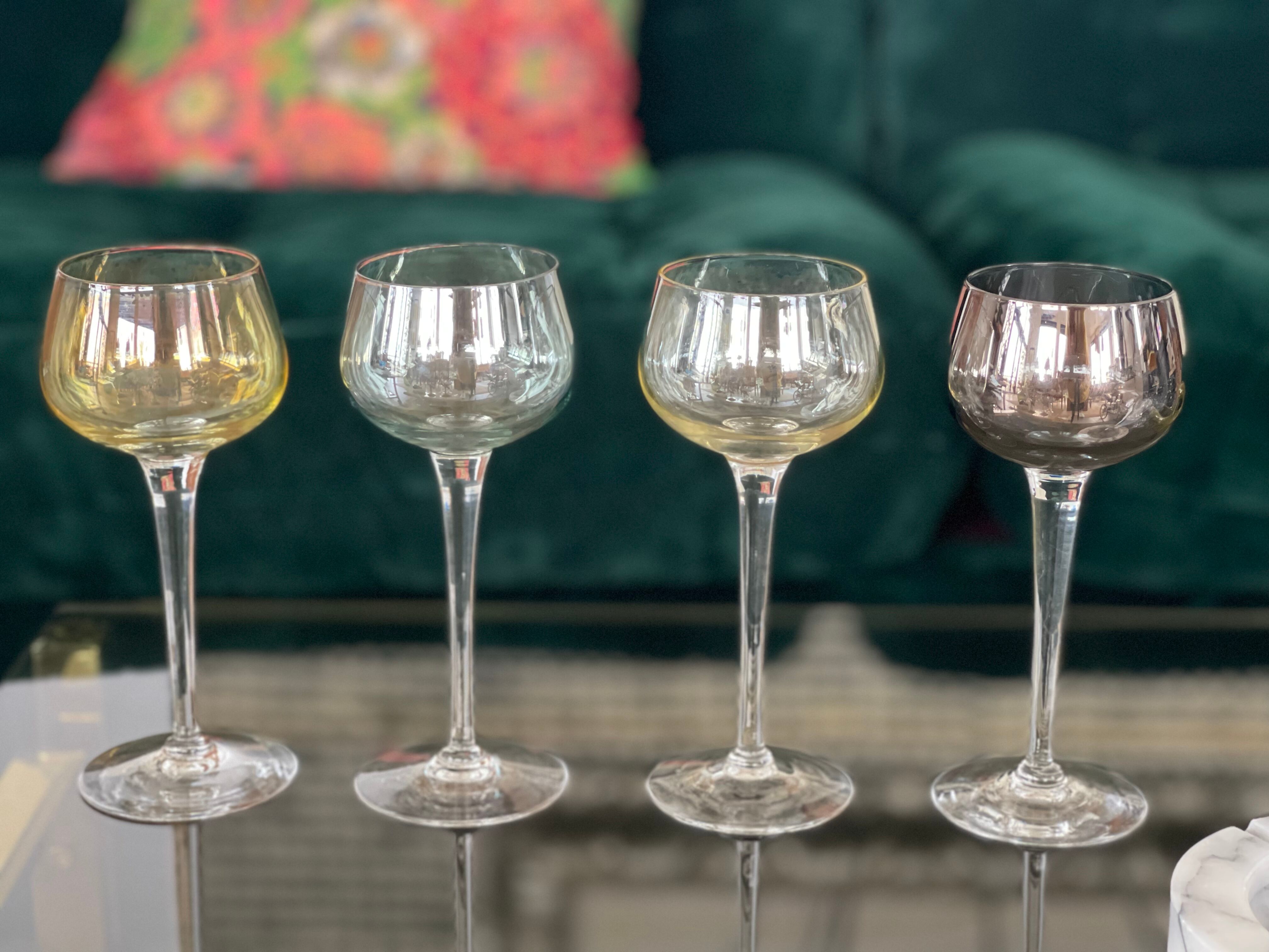 7 vintage iridescent foot glasses