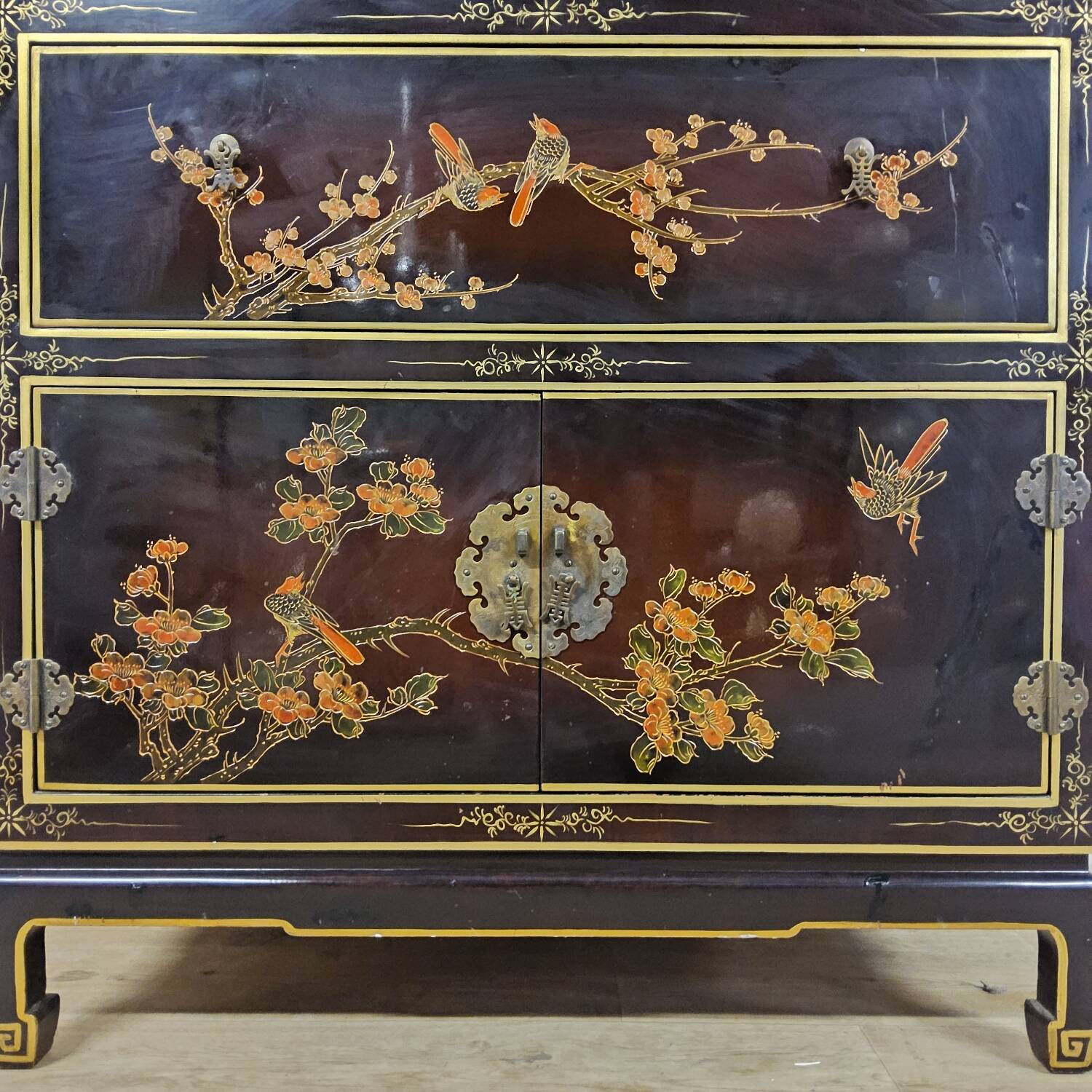Vintage red / gold Chinese lacquer cabinet with flowers and birds